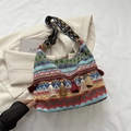 Borsa hobo boho all'uncinetto con motivi geometrici e nappe dai colori vivaci - Blu