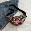 Crossbody crescent bag with vibrant floral patterns and adjustable black strap - Black
