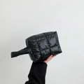 Minimalist black quilted nylon handbag for women with chic puffy texture and top zipper - Black