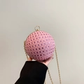 Elegant pink sequined spherical clutch bag with golden chain and ring handle - Pink