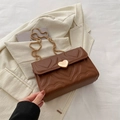 Brown heart-quilted crossbody bag with gold heart-shaped metal lock and chain strap - Brown