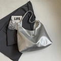 Minimalist silver metallic tote bag with wide strap for trendy commuting style - Silver