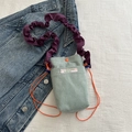 Mini mint green corduroy crossbody bag with purple pleated strap and orange drawstring - Light Green