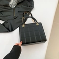 Chic black quilted chain crossbody bag with golden hardware and square pattern - Black