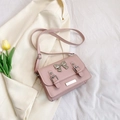 Borsa rosa stile Cambridge con fiocco in metallo e tracolla regolabile in pelle - Rosa
