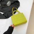 Chic quilted square crossbody bag in vibrant lime green leather with gold chain strap - Green