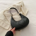 Chic black crescent underarm bag with embossed heart pattern and gold metal hardware - Black