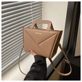 Detail of camel geometric folded handbag with yellow fashion text and handle - Khaki