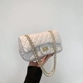 White quilted chain shoulder bag with gold metal clasp and rhombus pattern - White