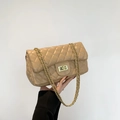 Elegant beige quilted crossbody bag with gold chain strap and metal turn-lock closure - Khaki