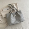 Minimalist grey high-capacity tote bag with silver chain and bow charm detail - Gray