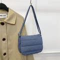 Blue quilted padded crossbody bag for women with matching shoulder strap and sleek finish - Blue