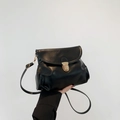 Chic black pleated crossbody bag for women with golden metal lock and adjustable strap - Black