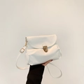 Minimalist white pleated crossbody bag for women with golden metal lock and PU leather texture - White