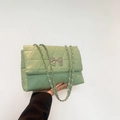 Quilted light green rectangular shoulder bag featuring silver bow and chain strap - Green