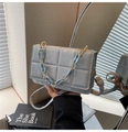 Detail of light blue quilted square handbag with gold and acrylic chain decor - Silver