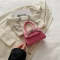 Petit sac rose en cuir avec nœud en strass et bandoulière chaîne argentée élégant - Rose rose