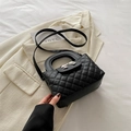 Borsa trapuntata nera con dettaglio a fiocco argento e tracolla in pelle regolabile - Nero
