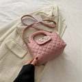 Pink quilted shoulder bag with silver bow accent and adjustable strap for women - Pink