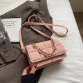 Pink quilted crossbody bag with marble texture finish and stylish chain decoration - Pink