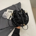 Black drawstring bucket bag with pleated texture and golden metal rings in black finish - No Pendant / Black (Without Charm)