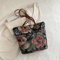 Tragetasche aus Jacquard-Gewebe mit Blumenmuster und braunen Ledergriffen - Schwarz