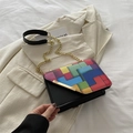 Fashionable chain shoulder bag with colorful geometric color block flap in black finish - Black