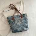 Retro-Shopper aus Jacquard mit blau-grünen Blumen und braunen Lederriemen - Blau