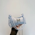 Borsa a tracolla azzurra con fiocco in argento e catena metallica rimovibile - Blu