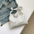 Weiße Canvas-Einkaufstasche mit lila Blumenmuster und verstellbarem Knotenschultergurt - Beige