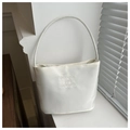 Detail of white bucket bag with onwards and upwards embroidery on premium fabric - White