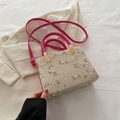 Borsa a mano in paglia ricamata color crema con motivi floreali e manici rosa chic - rosa acceso