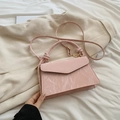 Pink marble pattern crossbody bag with knotted handle and gold hardware detail - Pink