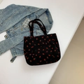 Black corduroy tote bag with red strawberry embroidery and sturdy shoulder straps - Black