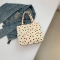 White corduroy tote bag with red strawberry print and front pocket for women - White