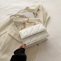 Elegant white quilted chain bag on beige blazer, minimalist crossbody shoulder bag for women - White