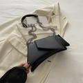 Asymmetric black matte leather shoulder bag with silver chain and geometric design - Black