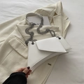 Chic white geometric shoulder bag with silver chain strap and minimalist leather finish - White