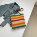 Rainbow striped woven tote bag with brown leather handles and casual summer knit texture - Rainbow