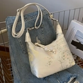 Modern Chinese style cream shoulder bag with floral embroidery and bead drawstring - Off-white