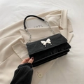 Black crinkle texture shoulder bag with white butterfly buckle and silver chain strap - Black