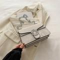 Elegant grey marble pattern crossbody bag with a sparkling rhinestone buckle and silver chain - Off White