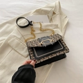 Fashionable tweed and black leather crossbody bag with elegant gold chain and metal buckle - Black