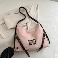 Rosa Y2K Schultertasche mit Metallschleife und verstellbaren braunen Riemen - Rosa