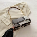 Rectangle shoulder bag featuring a grey plaid pattern with gold chain and leather handle - Gray