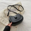 Elegant black crescent moon crossbody bag with matte leather finish and adjustable strap - Black