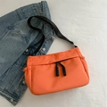 Bright orange nylon crossbody tote bag with black adjustable strap and dual zipper detail - Orange