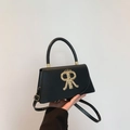Retro black leather crossbody bag with golden crown R logo and top handle for women - Black
