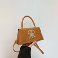 Brown leather crossbody bag with golden crown R metal logo and top handle in a mini size - Brown