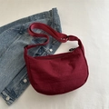 Minimalist burgundy nylon half-moon crossbody bag with adjustable wide shoulder strap - Red